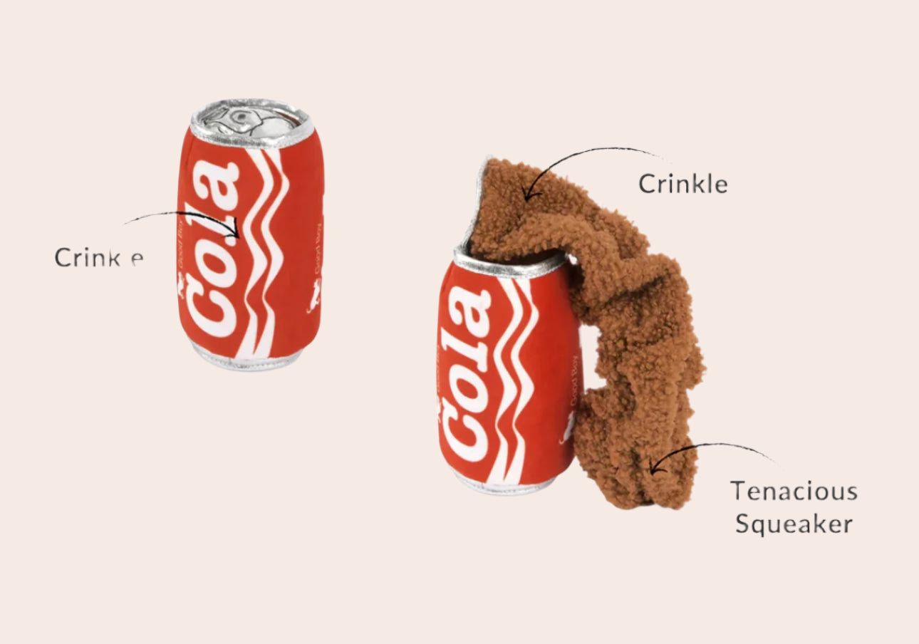Dog toy shaped like a Coca-Cola can with labeled features on a white background