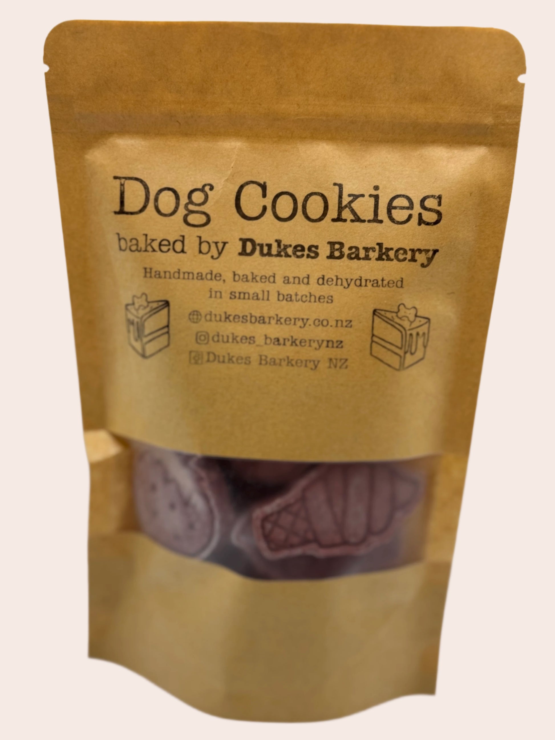 Kraft paper packaging of 'Dog Cookies' by Dukes Barkery on a white background